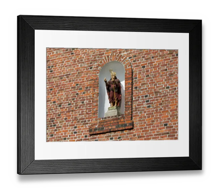 Framed Print : St. Nikolai on the church facade in Altenbruch Framed Print : St. Nikolai on the church facade in Altenbruch