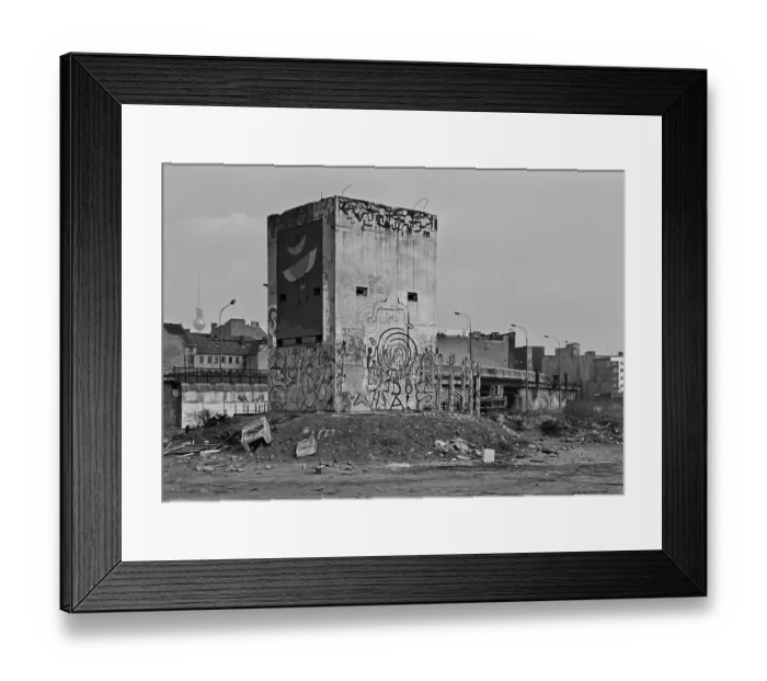 Framed Print : Former GDR watchtower after the fall of the Wall between the city railway and the Spree