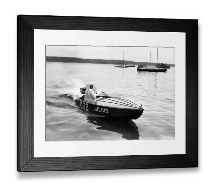 Framed Print : Historic photograph, man in a motorboat