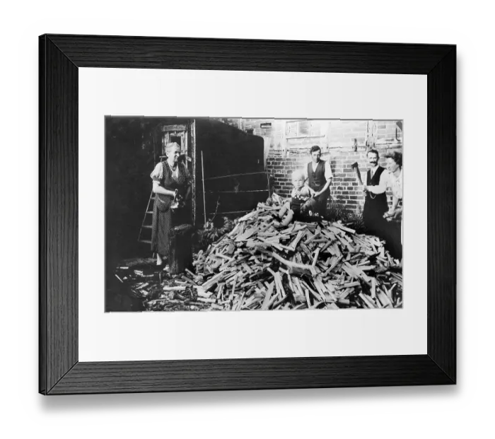 Framed Print : Historic photograph, baby sitting on a pile of firewood Framed Print : Historic photograph, baby sitting on a pile of firewood