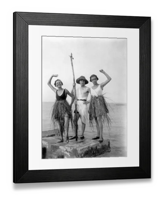 Framed Print : Historic photograph, one man, two women wearing bast skirts Framed Print : Historic photograph, one man, two women wearing bast skirts