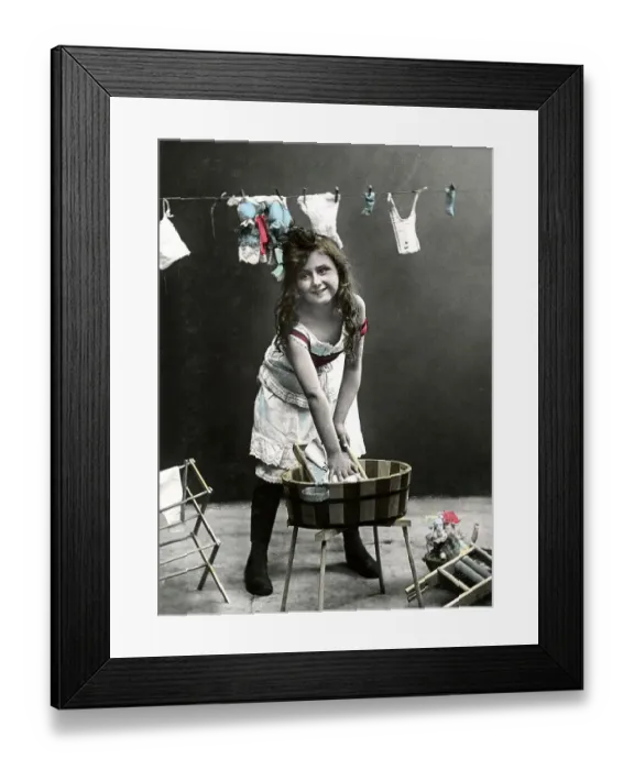 Framed Print : Historic photograph, girl doing laundry
