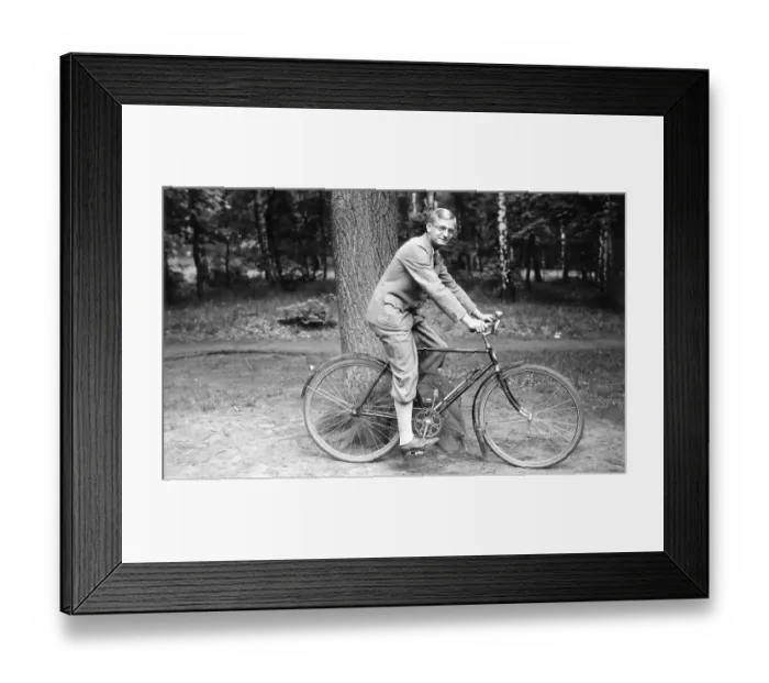 Framed Print : Historic photograph, man on a bicycle, around 1925