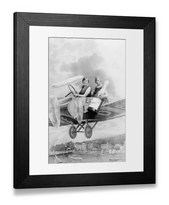 Framed Print : Historic photograph, two women in a cardboard aeroplane