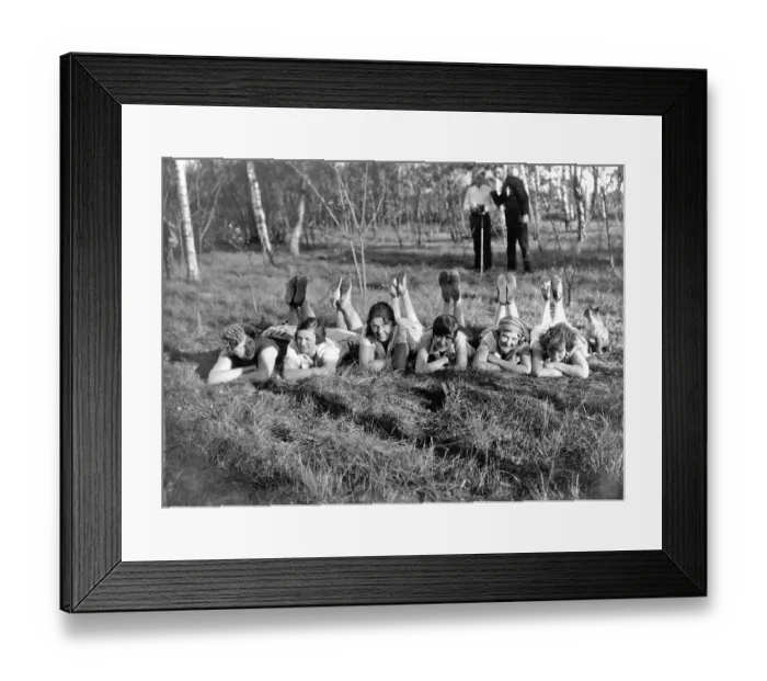 Framed Print : Historic photograph, women lying in the grass with their feet in the air Framed Print : Historic photograph, women lying in the grass with their feet in the air