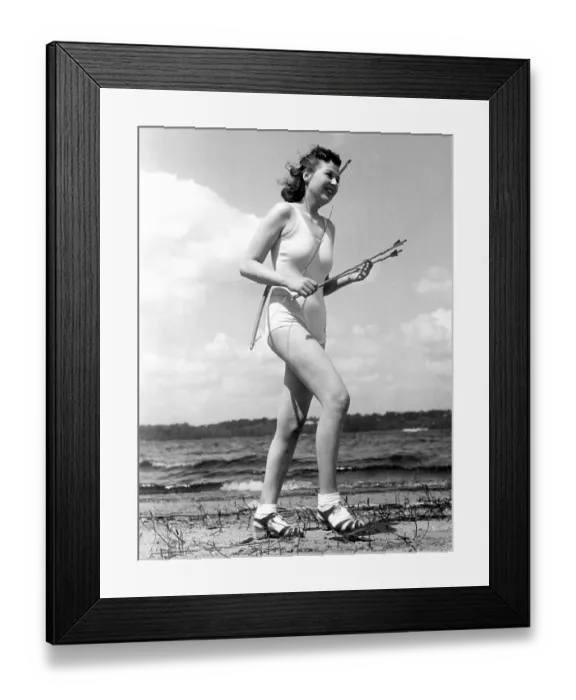 Framed Print : Historical image, female archer, ca. 1940 Framed Print : Historical image, female archer, ca. 1940