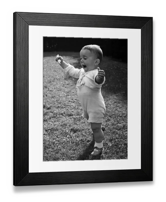 Framed Print : Historic photograph, small boy learning to walk