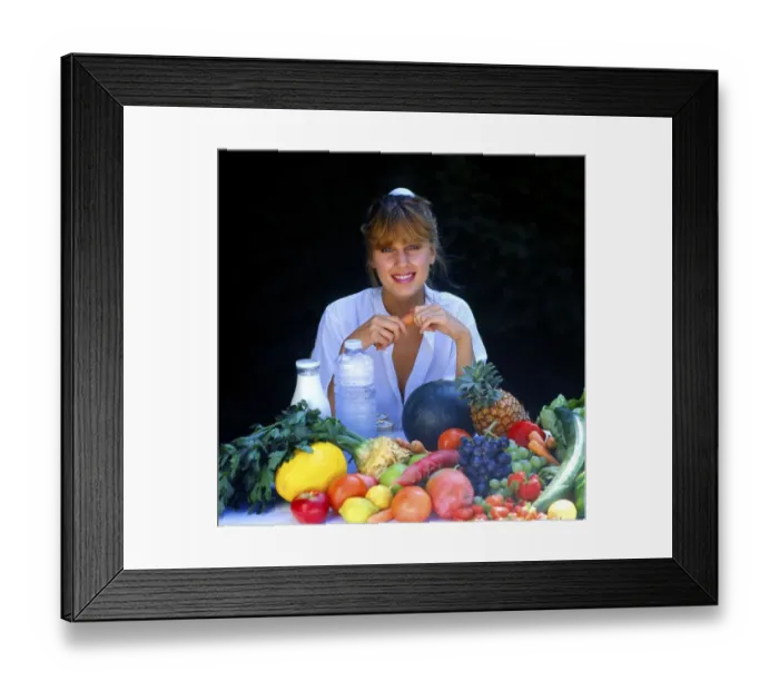 Framed Print : Young woman with fruit and milk Framed Print : Young woman with fruit and milk