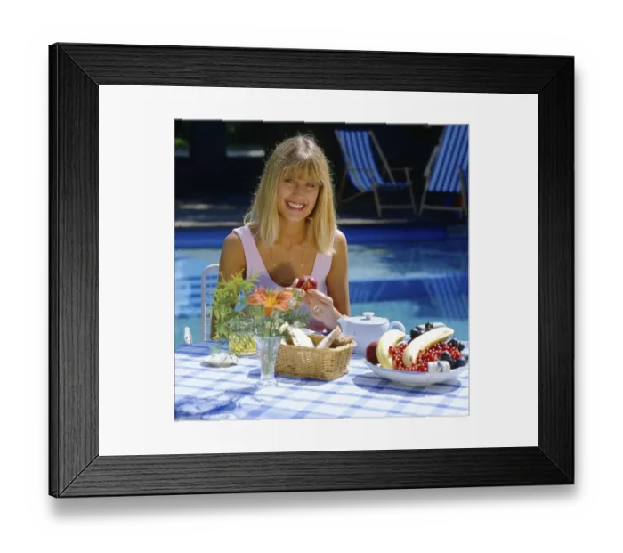 Framed Print : Woman at breakfast Bread, fruit Framed Print : Woman at breakfast Bread, fruit