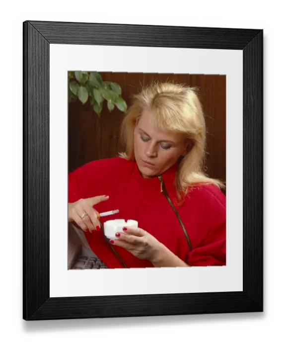 Framed Print : Office, young woman, smokes at work
