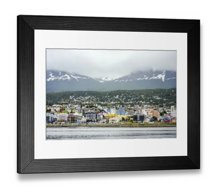 Framed Print : View of Ushuaia city on a cloudy day from the ocean