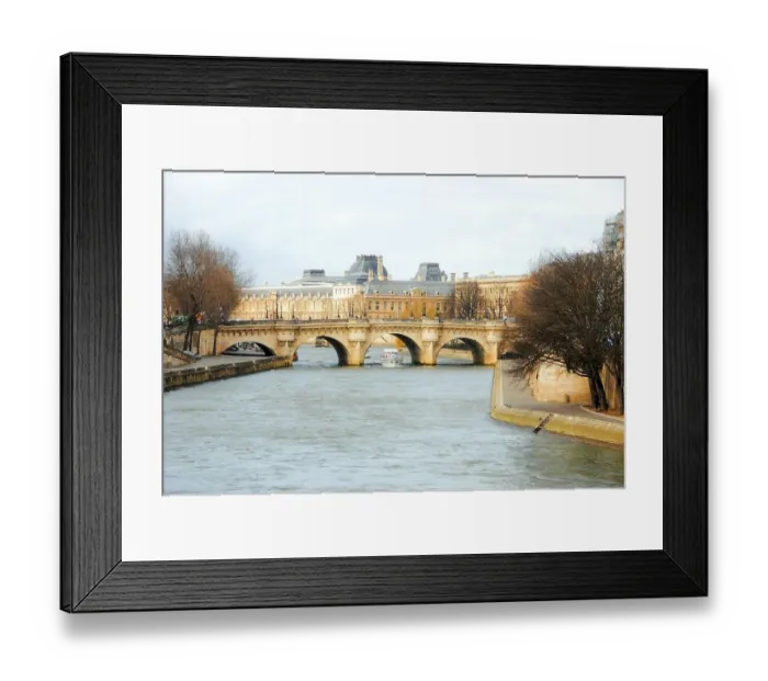 Framed Print : View of a bridge over the Seine river at sunset