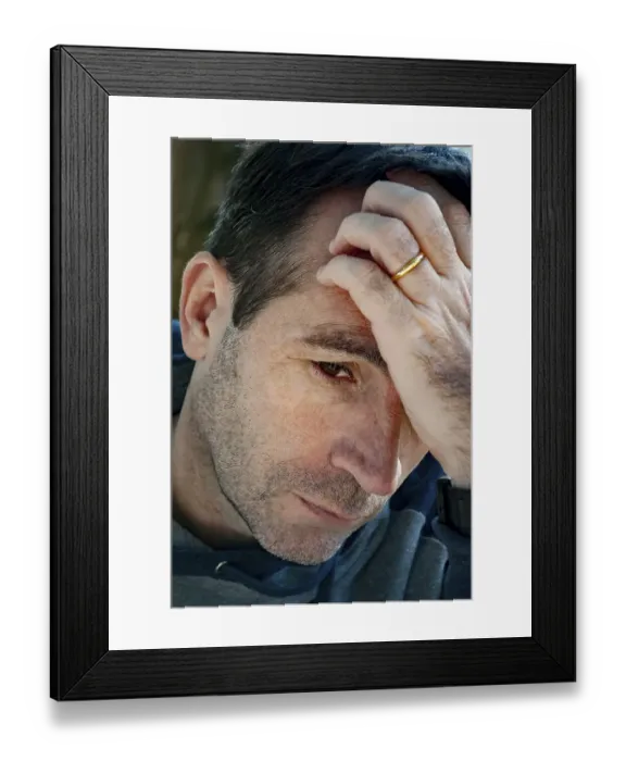 Framed Print : Worried man thinking with his hand on his forehead