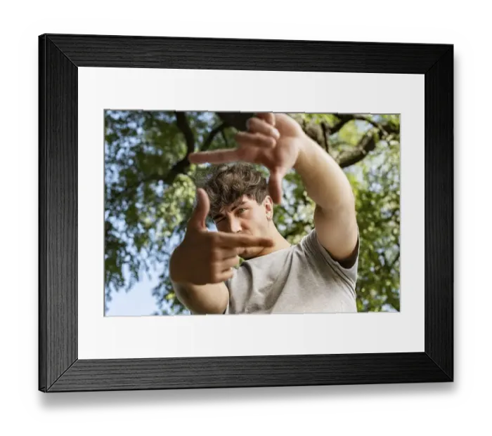 Framed Print : Man framing photograph over nature background