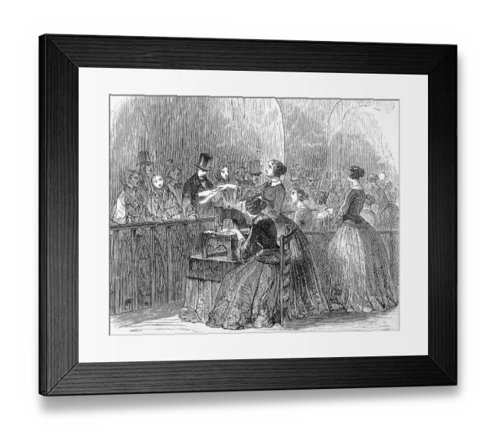 Framed Print : One woman sews on the sewing machine