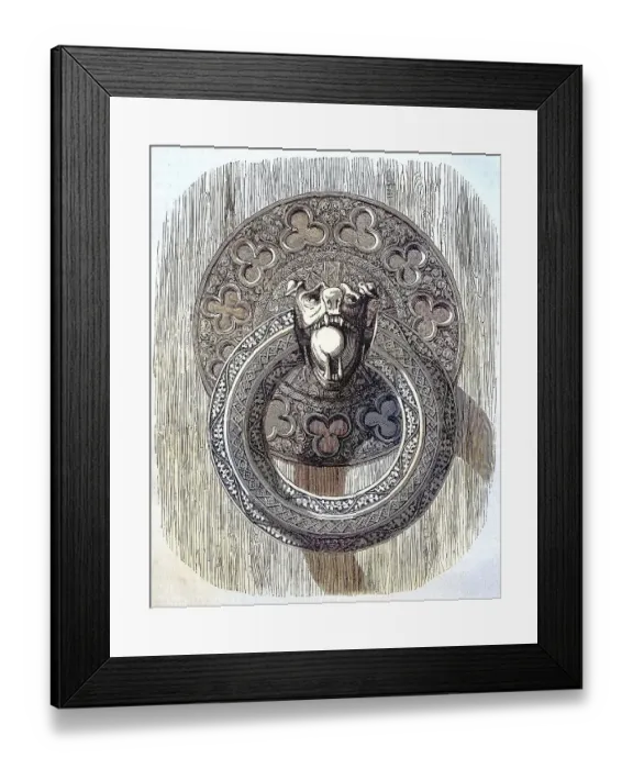 Framed Print : A finely chiselled iron ring, door handle on one of the inner doors of Bourges Cathedral