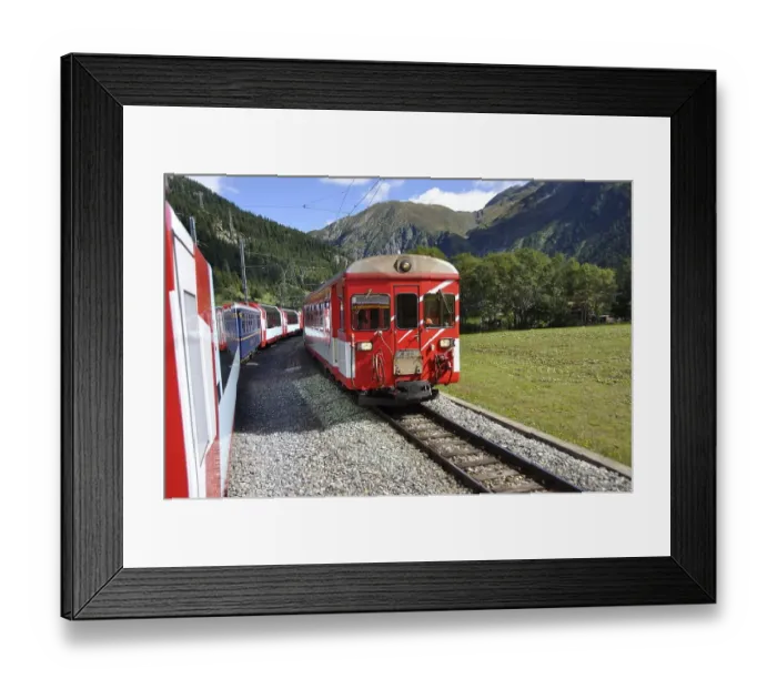 Framed Print : The Glacier Express train is driving across the swiss alps and through the Unesco World heritage from Zermatt to St
