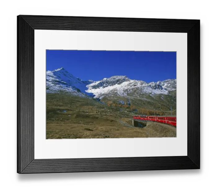 Framed Print : Railway journey on the Rhaetian Railway past Lago Bianco on the Bernina Pass