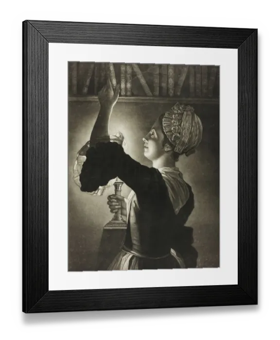 Framed Print : Woman with a candle lamp takes a book from the shelf Framed Print : Woman with a candle lamp takes a book from the shelf
