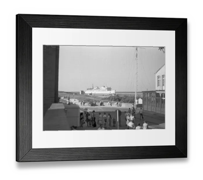 Framed Print : 15.06.1970, view of the harbour entrance of Warnemuende with the incoming ferry of the Deutsche Reichsbahn Warnemuende. In the foreground a queue of customers at a snack bar. Warnemuende, Rostock district, GDR GDR Framed Print : 15.06.1970, view of the harbour entrance of Warnemuende with the incoming ferry of the Deutsche Reichsbahn Warnemuende. In the foreground a queue of customers at a snack bar. Warnemuende, Rostock district, GDR GDR