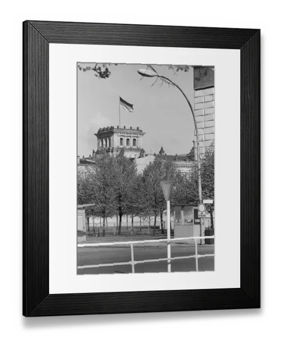 Framed Print : 25.10.1970, GDR, East Berlin, view from the street Unter den Linden to the flag of the Federal Republic of Germany on the Reichstag, which is located in the western part of Berlin. East Berlin, Berlin-Mitte, GDR GDR