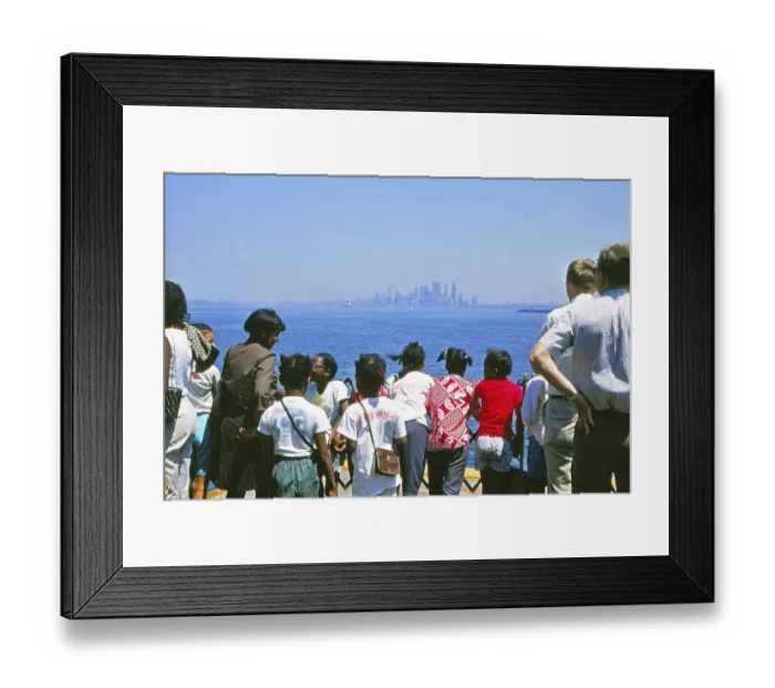 Framed Print : Southern Manhattan, seen from a ferry with black children, New York in 1966