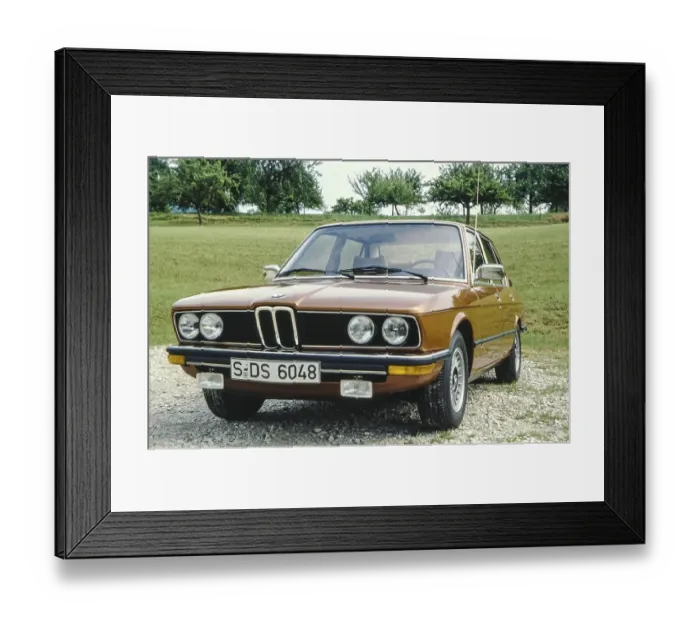 Framed Print : BMW 525 with factory code designation E12, first BMW of the 5 Series, produced from summer 1972 to mid-1981, here in brown metallic paint, photographed in summer 1979 Framed Print : BMW 525 with factory code designation E12, first BMW of the 5 Series, produced from summer 1972 to mid-1981, here in brown metallic paint, photographed in summer 1979