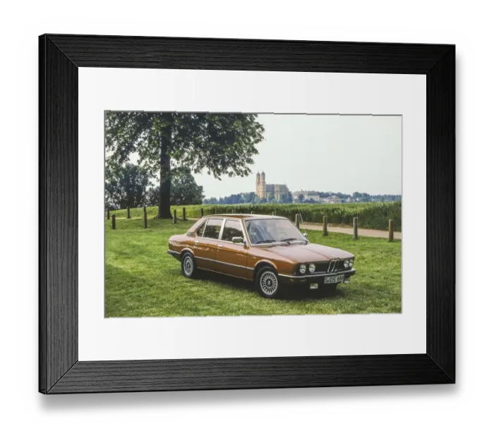 Framed Print : BMW 525 with factory code designation E12, first BMW of the 5 Series, produced from summer 1972 to mid-1981, here in brown metallic paint, photographed in summer 1979 in front of the pilgrimage church of St Maria, Ellwangen, Baden-Wuerttemberg Framed Print : BMW 525 with factory code designation E12, first BMW of the 5 Series, produced from summer 1972 to mid-1981, here in brown metallic paint, photographed in summer 1979 in front of the pilgrimage church of St Maria, Ellwangen, Baden-Wuerttemberg