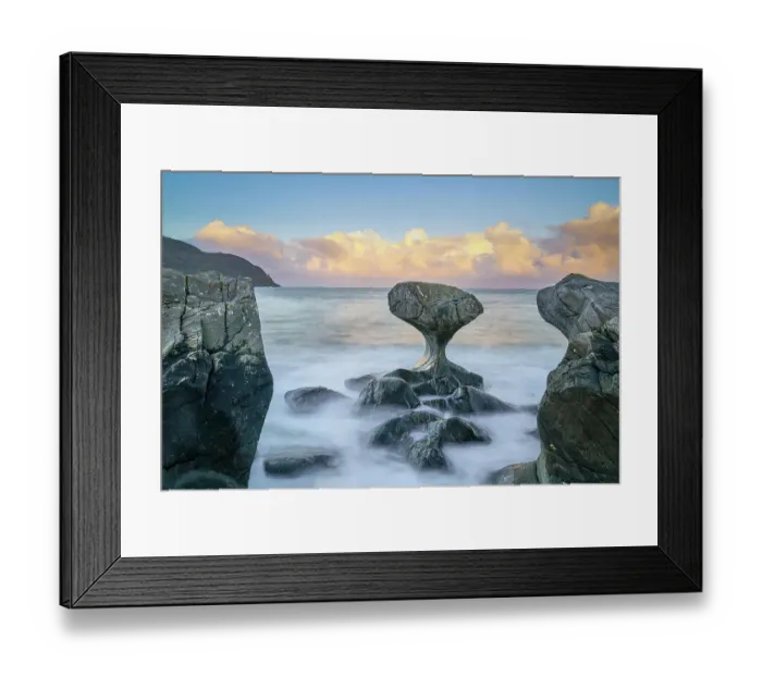 Framed Print : Kannesteinen at sunrise, clouds and blue sky, North Sea, Oppedal, Vågsøy, Norway, Europe