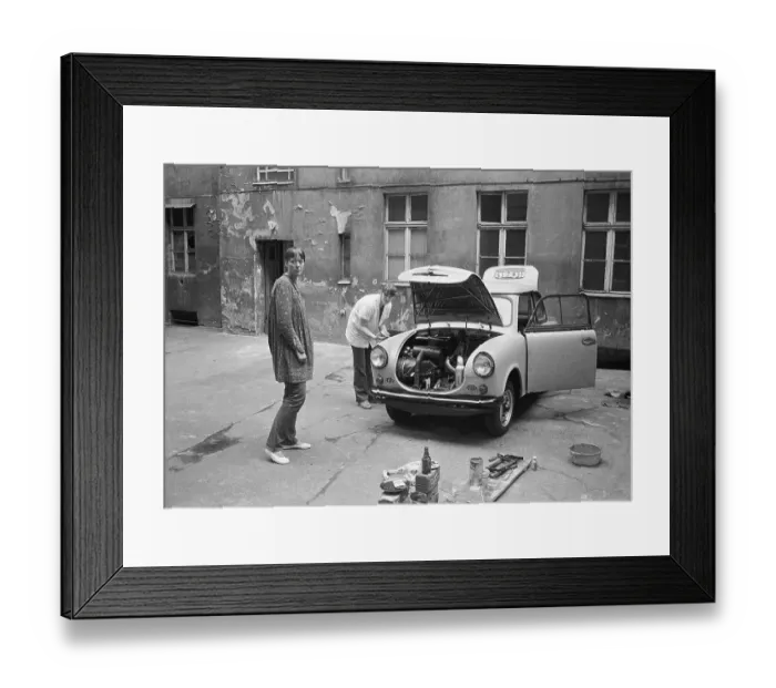 Framed Print : 06.05.1982 GDR East Berlin district Prenzlauer Berg, Stargarder Strasse, car repair on a backyard, a car type Trabant 600, year of construction 1963, is repaired by the owner, East Berlin, Berlin-Mitte, GDR GDR