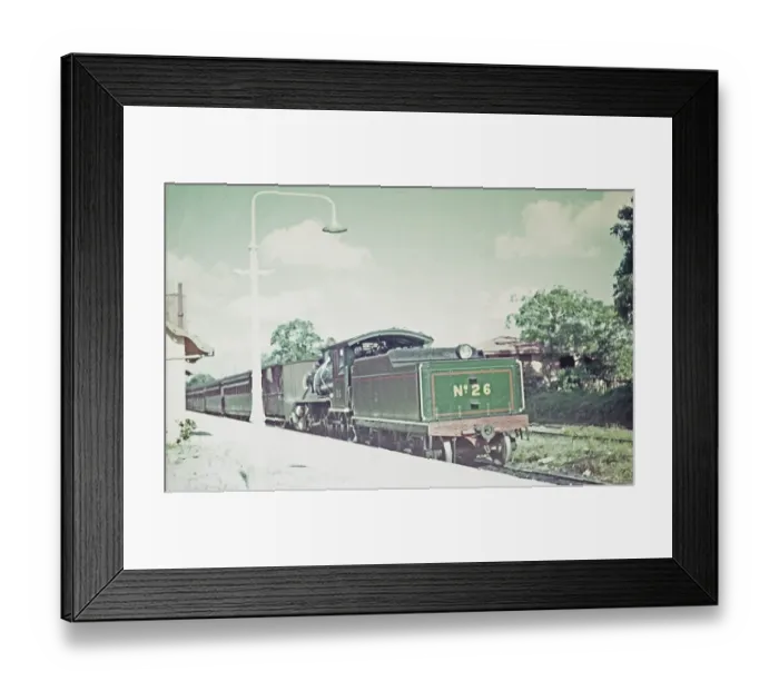 Framed Print : Steam train number 26 and passenger carriages at railway station platform, Arima, Trinidad early 1960s