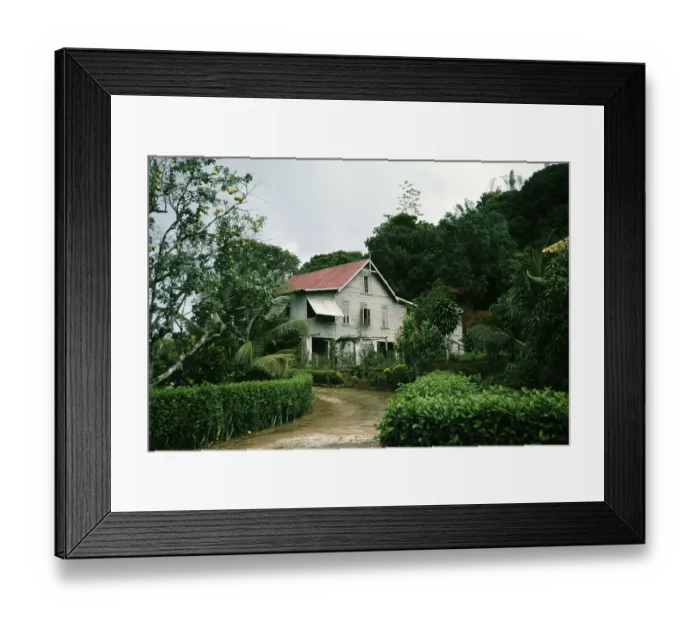 Framed Print : Historic architecture wooden house with corrugated iron roof of cocoa estate, Trinidad, Trinidad and Tobago 1961-1963