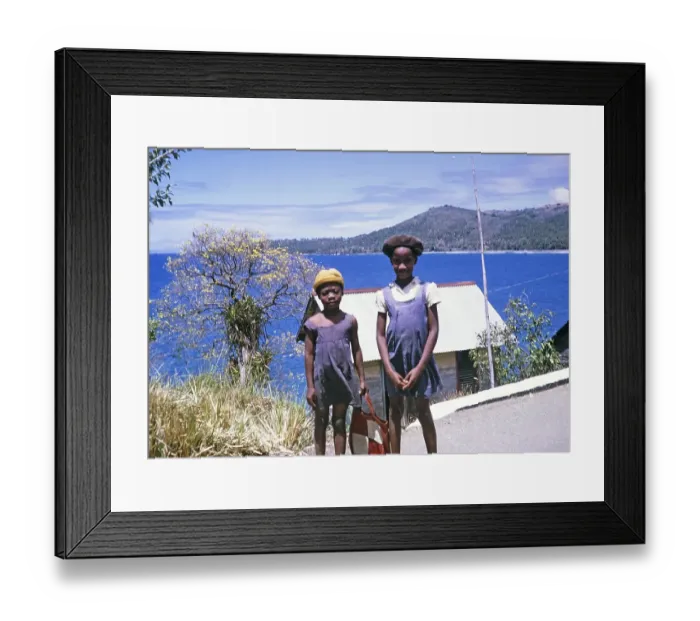 Framed Print : Captioned as Citizens of Trinidad and Tobago 1962 two young girls standing with tropical coastal landscape background Framed Print : Captioned as Citizens of Trinidad and Tobago 1962 two young girls standing with tropical coastal landscape background