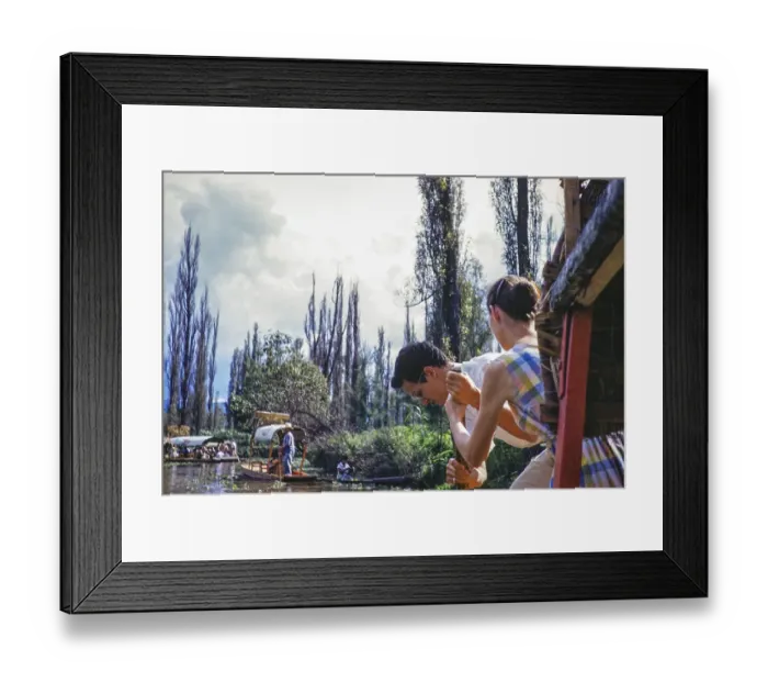 Framed Print : People staking out on boats on the canalas in Xochimilco, Ciudad de Mexico, Mexico City, CDMX, Mexico around 1961