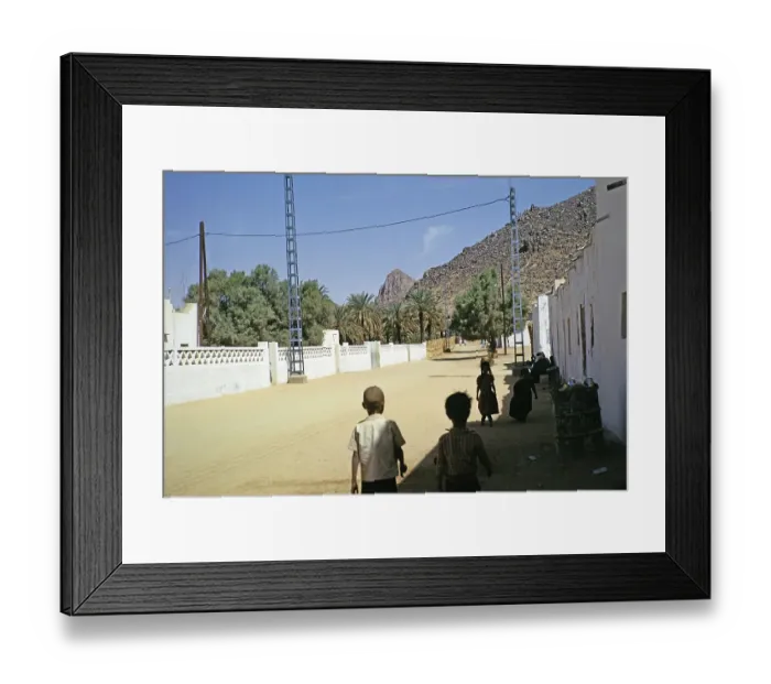 Framed Print : Date palms and buildings of the oasis settlement of Djanet in the Sahara Desert, Algeria, North Africa 1973, Africa Framed Print : Date palms and buildings of the oasis settlement of Djanet in the Sahara Desert, Algeria, North Africa 1973, Africa