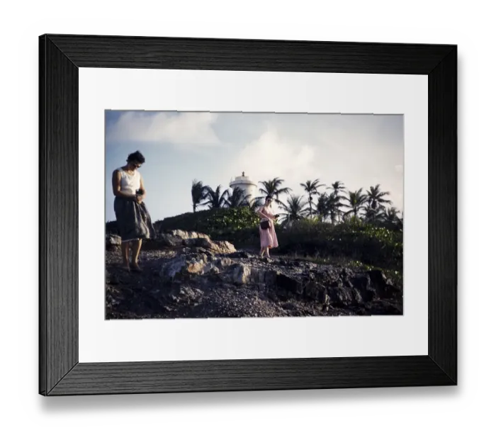 Framed Print : Two women walking on rocky shoreline on the coast at Toco, Trinidad c 1963