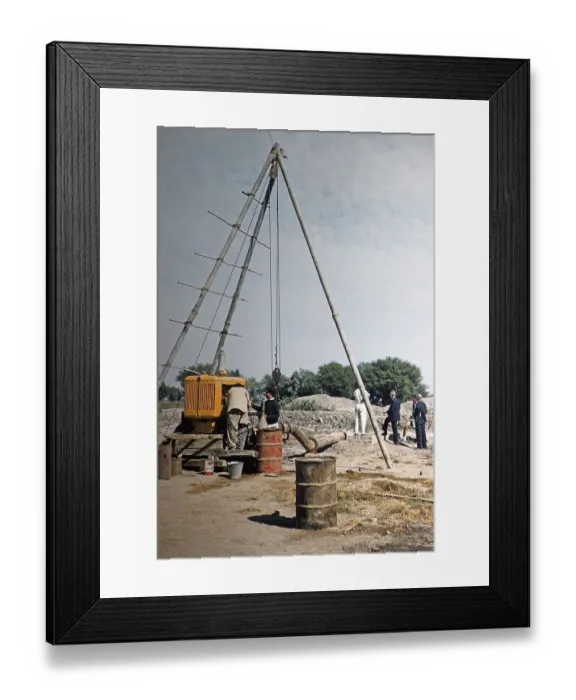 Framed Print : Tripod crane and generator in use Water supply technology Irrigation project Pakistan, 1963 Framed Print : Tripod crane and generator in use Water supply technology Irrigation project Pakistan, 1963