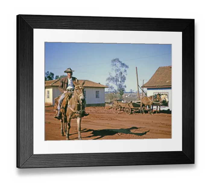 Framed Print : Man on horseback riding through the street in Laranjeiras do Sol, state of Parana, Brazil, 1962, South America Framed Print : Man on horseback riding through the street in Laranjeiras do Sol, state of Parana, Brazil, 1962, South America