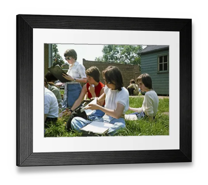 Framed Print : Secondary school girls doing fieldwork in geography, Great Britain 1970s Girls with clipboards sitting in the grass 1977