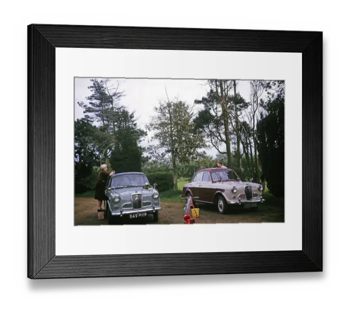 Framed Print : 1961 Wolseley 1500 Mk III car, two women washing two new cars, Norfolk England UK photographed 1964
