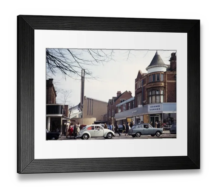 Framed Print : Cars, including VW Volkswagen Bettle, and shoppers at Adams Corner and the modern church of St Dunstans, Kings Heath, Birmingham, West Midlands, England, UK 1972