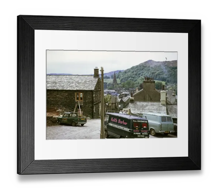Framed Print : Work vehicles parked in the village of Ambleside, Lake District, Cumbria, England, UK 1973