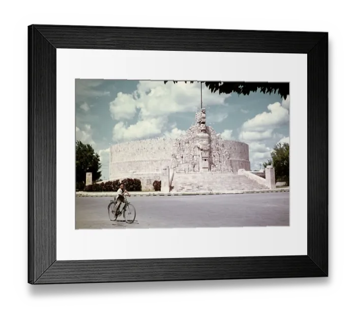 Framed Print : Boy riding a bicycle at the Monumento a la Patria, Monument to the Homeland, Paseo de Montejo, Merida, Yucatan, Mexico, around 1961, created by Romulo Rozo, Central America