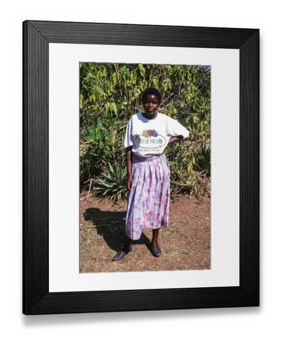 Framed Print : Full body portrait of a standing young woman with Fruit of the Look T Shirt, Malawi, Southern Africa, 1995, Africa