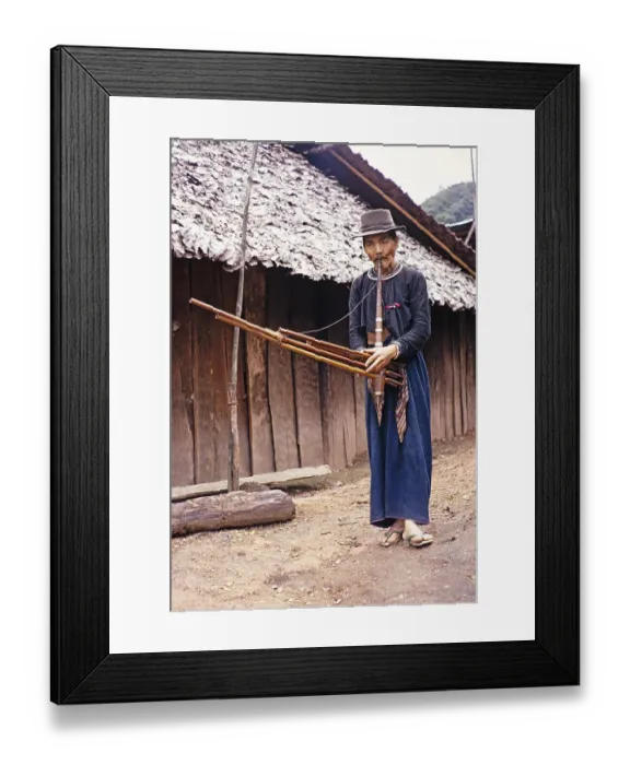 Framed Print : Elderly Laotian man playing a musical instrument, Northern Thailand, Asia 1971 Framed Print : Elderly Laotian man playing a musical instrument, Northern Thailand, Asia 1971