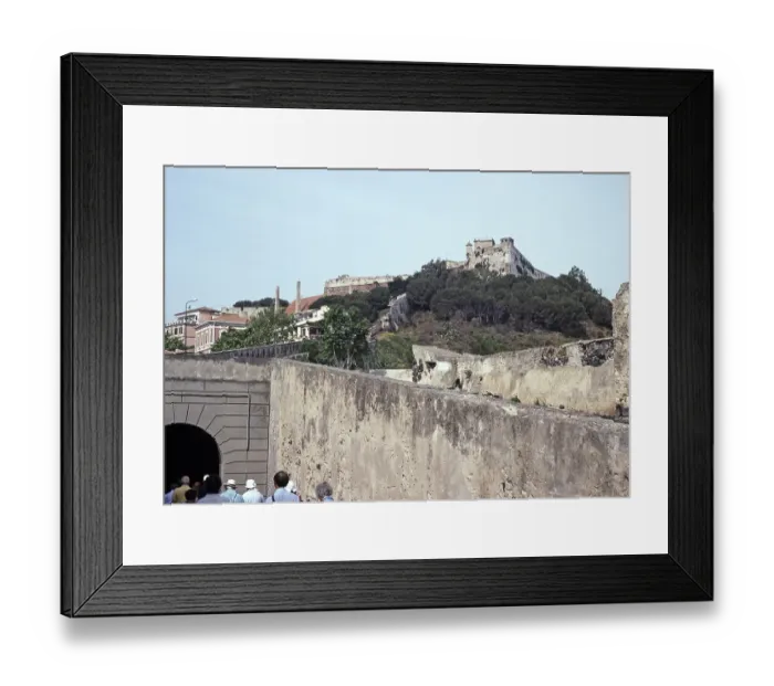 Framed Print : Tour group on the Via Victor Hugo below the historic Fort Falcone, Portoferraio, Elba Island, Italy, 1999, Europe