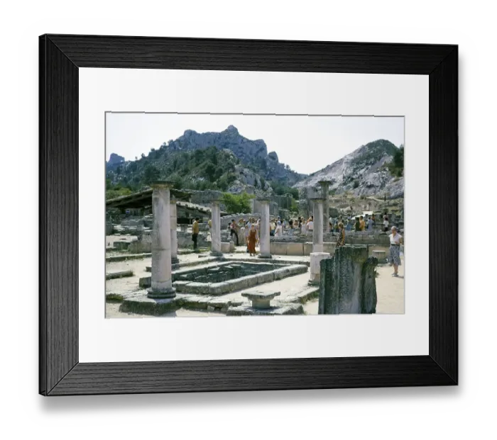Framed Print : Tourists exploring the Roman archaeological site in Glanum, St Remy de Provence, France 1975