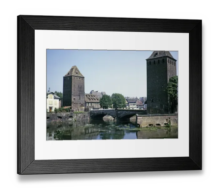 Framed Print : Towers of the medieval Ponts Couverts bridge over the River Ill in the Petite France neighbourhood of Strasbourg, France 1974