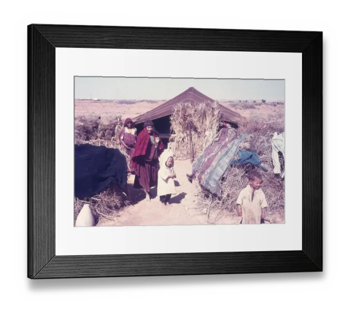 Framed Print : Nomadic Bedouin people by their desert tent in North Africa