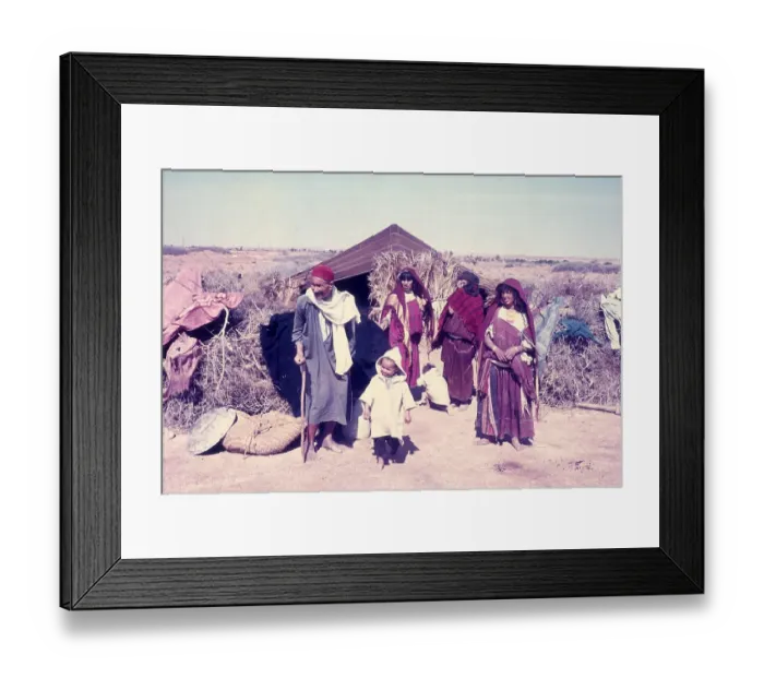 Framed Print : Nomadic Bedouin people by their desert tent in North Africa Framed Print : Nomadic Bedouin people by their desert tent in North Africa